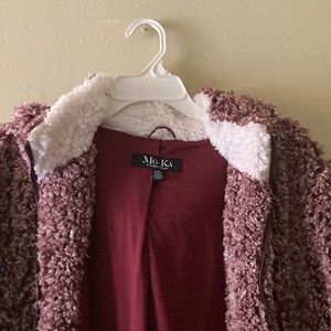 Burgundy sweater/ jacket.